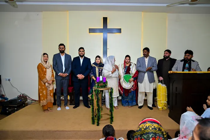 The team dedicating the building before the congregation