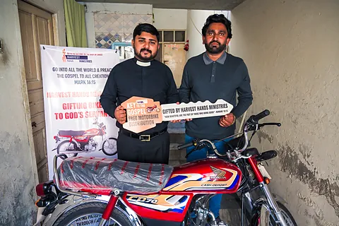 A pastor receives his motorbike