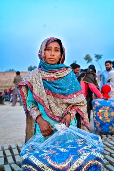 Winter blanket distribution at a brick kiln colony